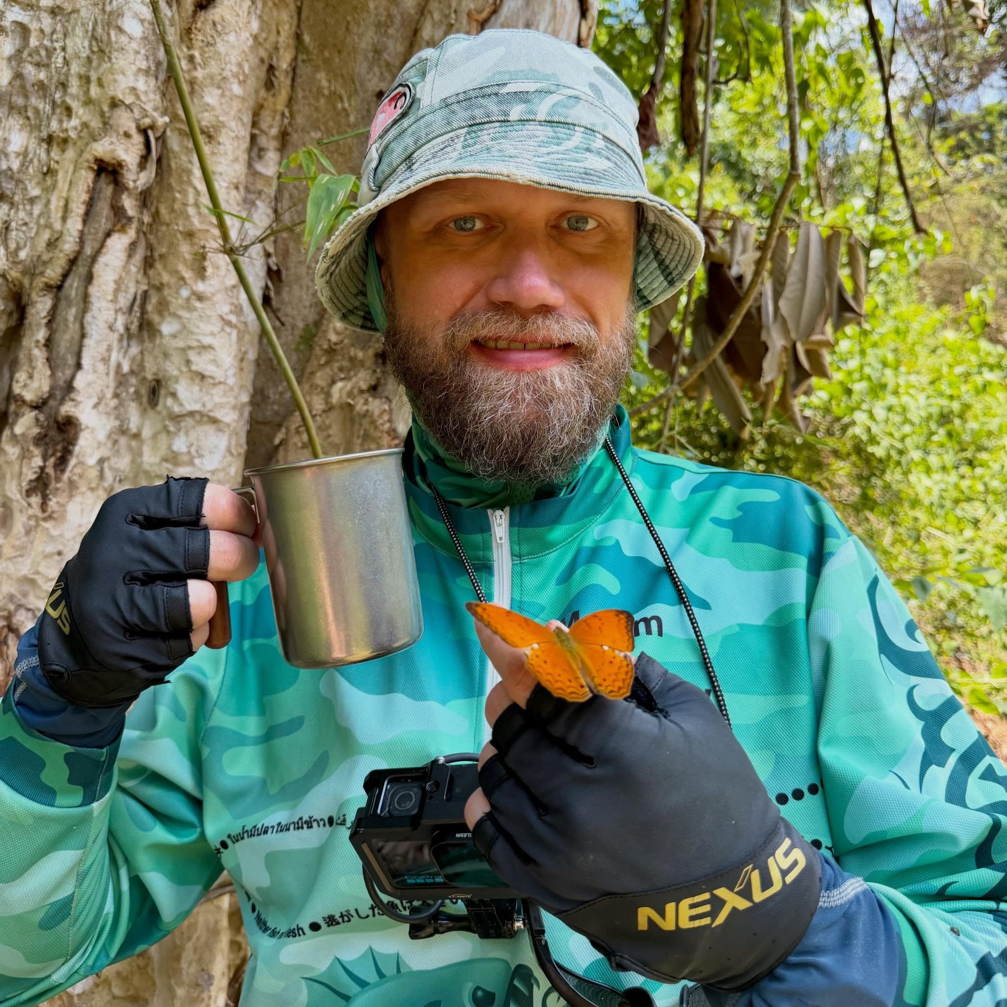 Morning coffee in the deep jungles with butterfly